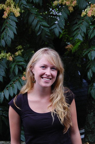 On-set teacher Shauna Chandler, smiling and surrounded by greenery.